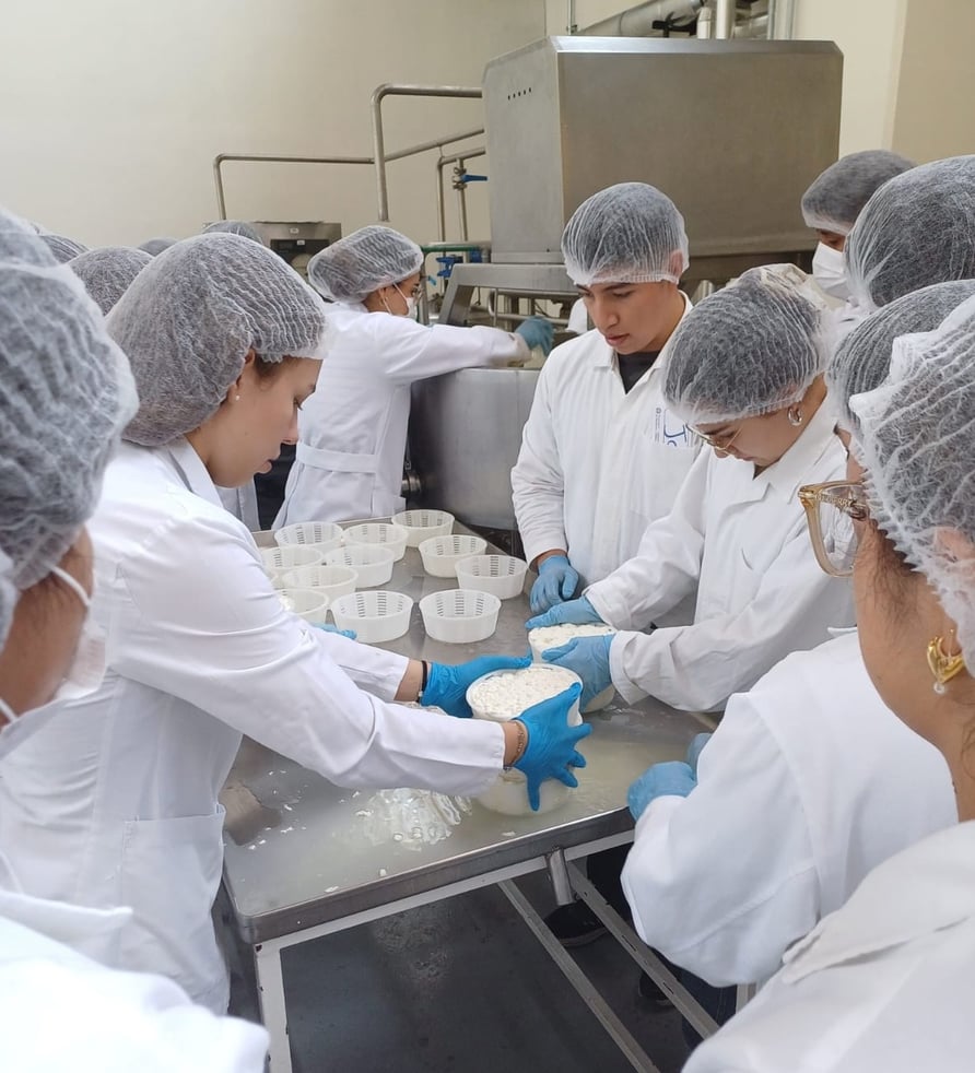 TDM students with cheese